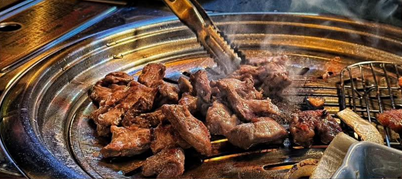 Premium meat grilled over charcoal at Hongdae